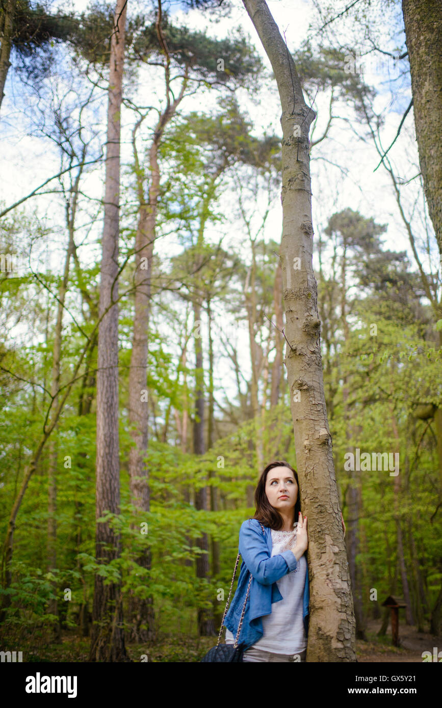 Young girl on a walk in the forest Stock Photo - Alamy