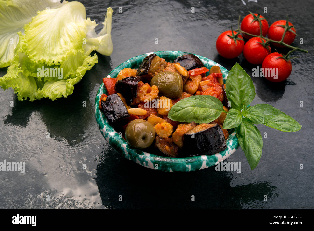 Sicilian eggplant caponata is a salad with tomatoes vinegar pine nuts