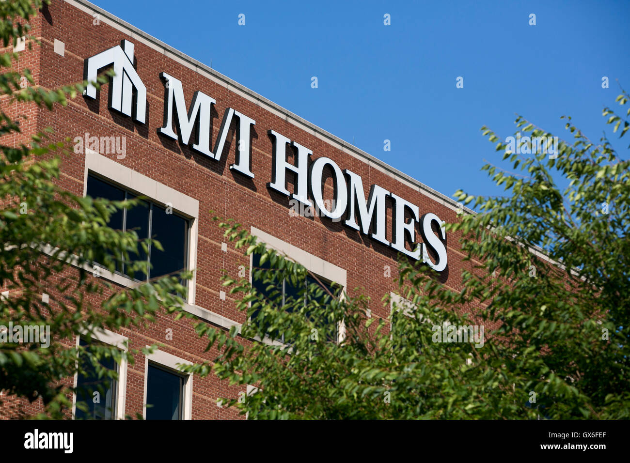 A logo sign outside of the headquarters of M/I Homes, Inc., in Columbus