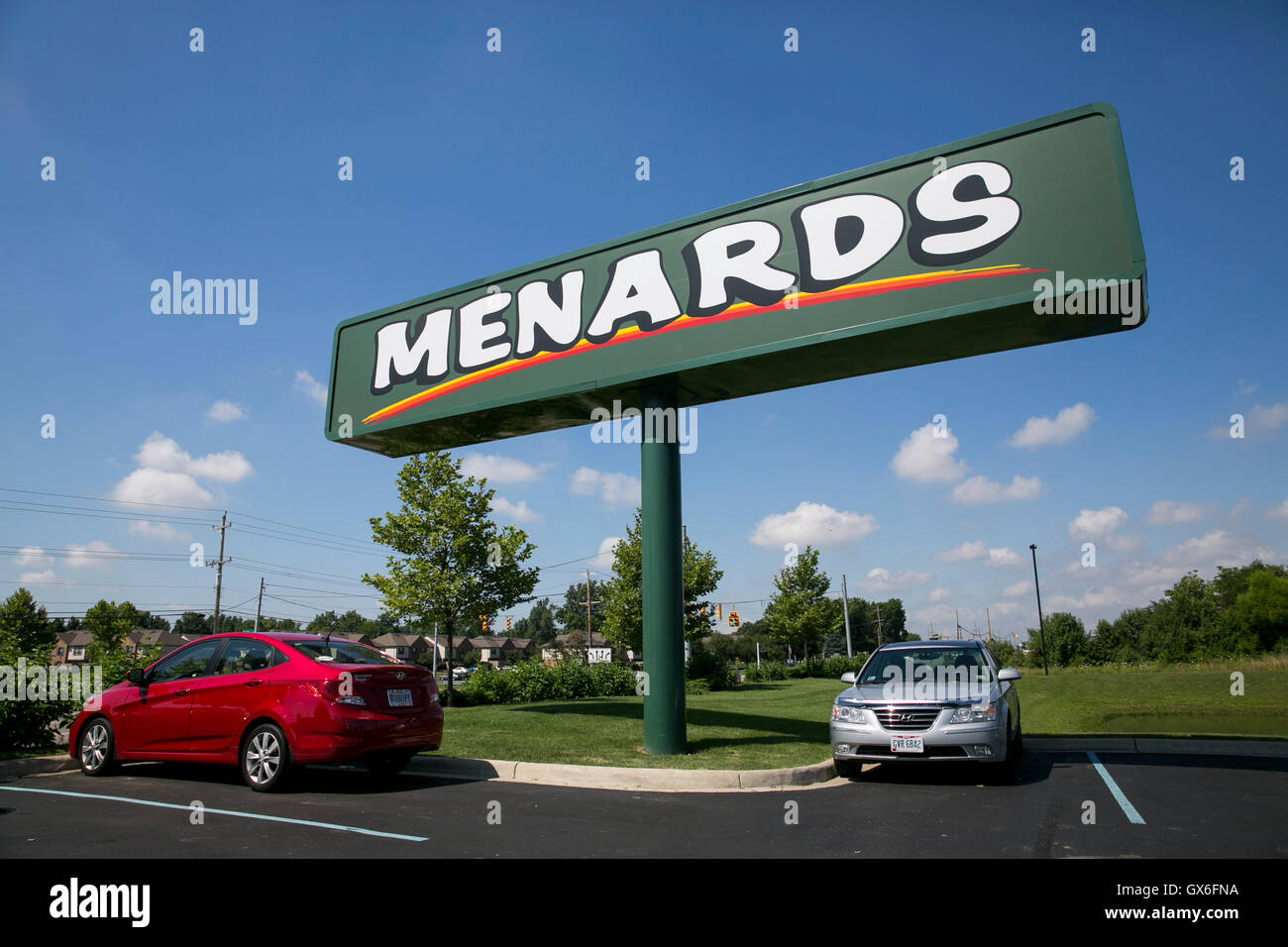 A logo sign outside of a Menards retail store in Columbus, Ohio on July 23, 2016. Stock Photo