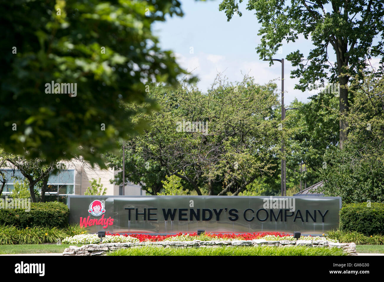 A logo sign outside of the headquarters of The Wendy's Company fast food restaurant chain in