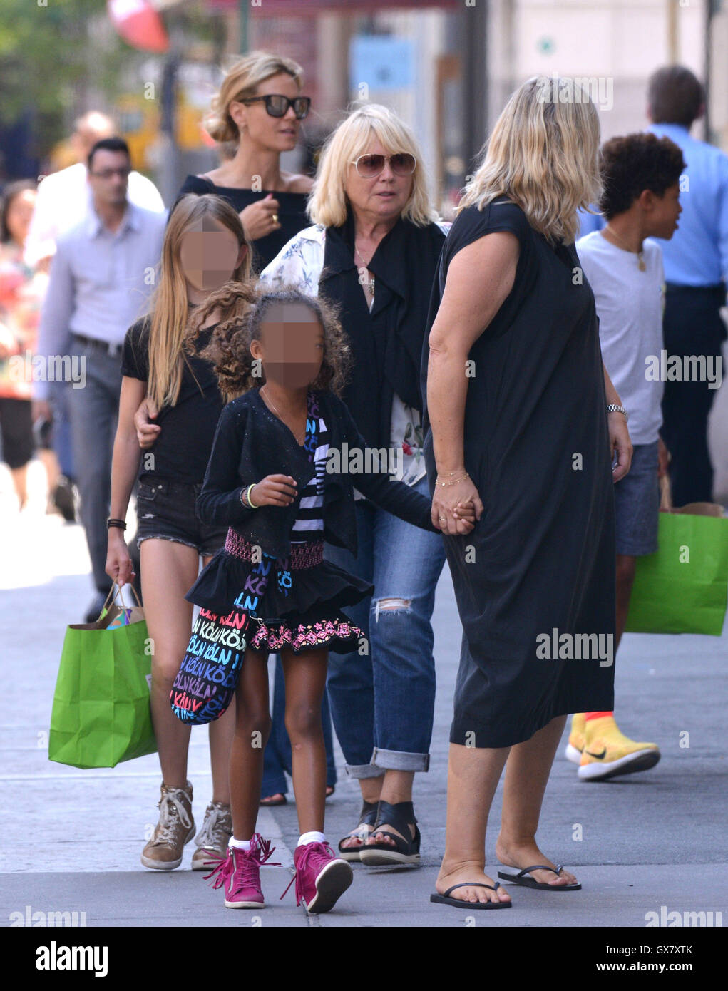 Heidi Klum and her family walking around the Tribeca neighborhood in Lower Manhattan  Featuring: Heidi Klum, Helene Boshoven Samuel Where: New York City, New York, United States When: 27 Jun 2016 Stock Photo