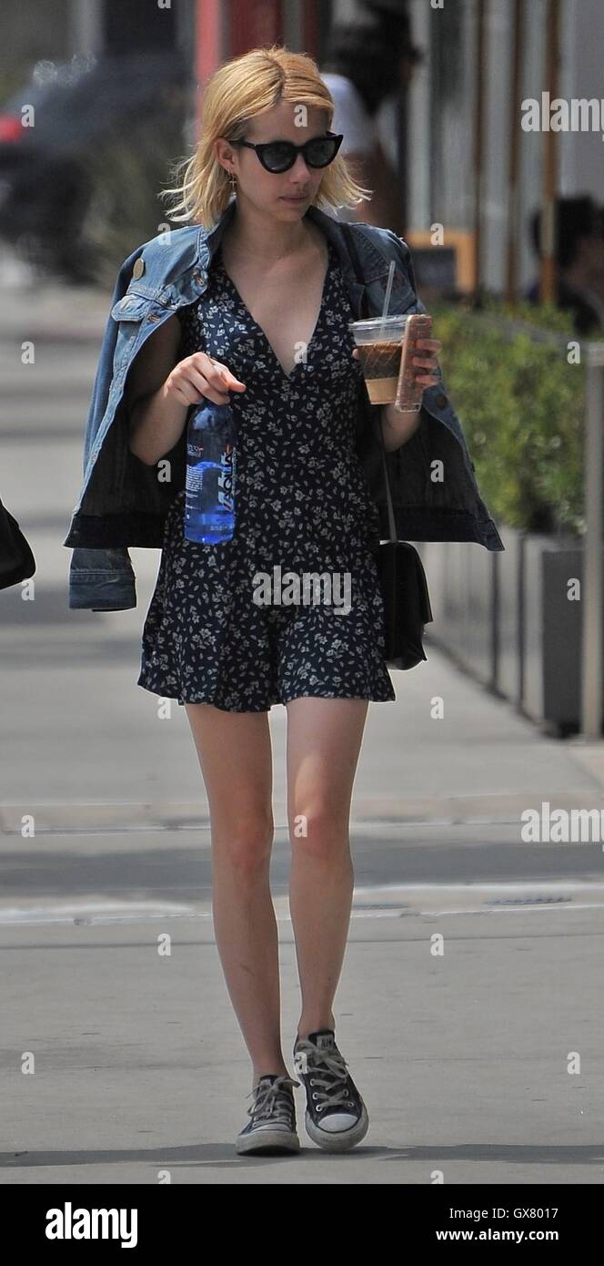 Emma Roberts out and about in Los Angeles wearing a short black floral dress and denim jacket. Featuring Emma Roberts Where Los Angeles California United Kingdom When 28 Jun 2016 Stock Photo Alamy