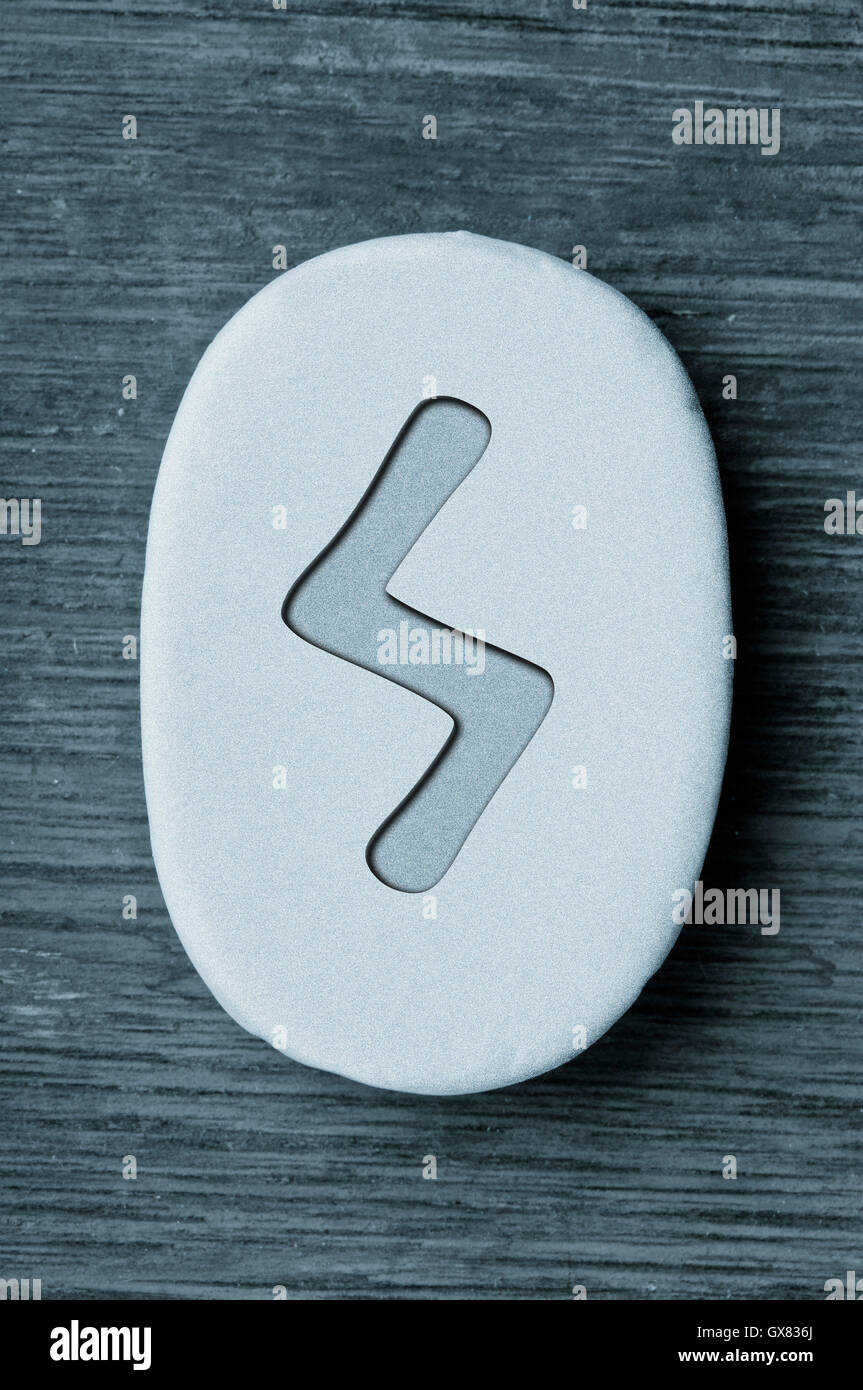 rune symbol Sowulo on stone Stock Photo - Alamy