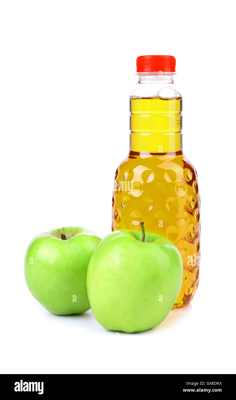 Apple juice in plastic bottle and two apples Stock Photo Alamy