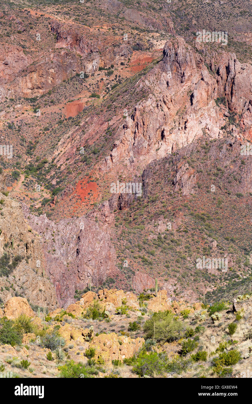 Large rocky outcroppings stained with minerals creating a colorful and ... - Landscape With Rocky Outcroppings