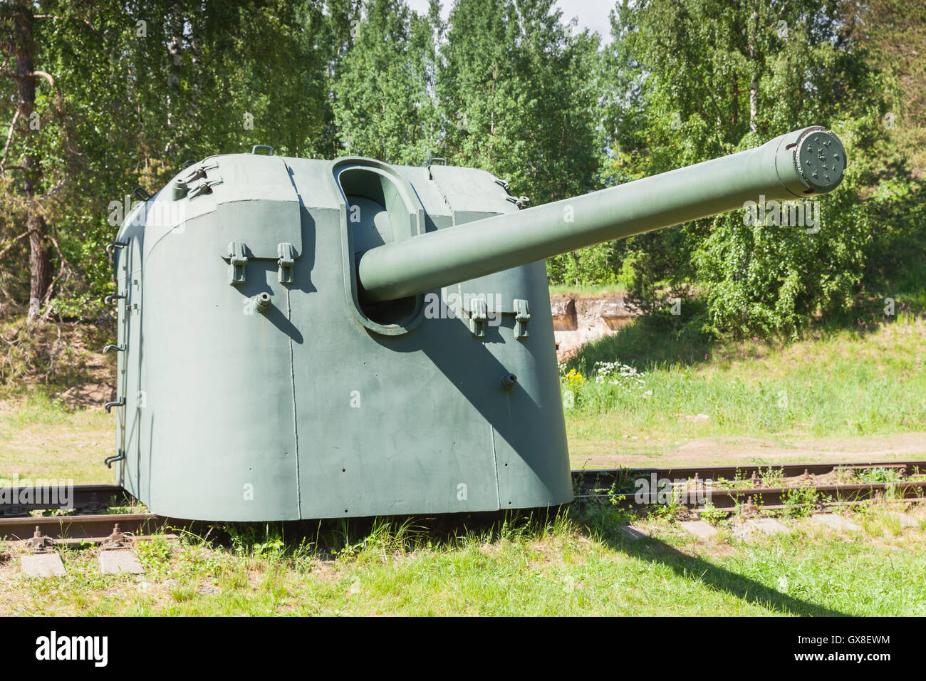 Cannon on railway. Krasnaya Gorka fort. Historical monument from WWII Stock Photo