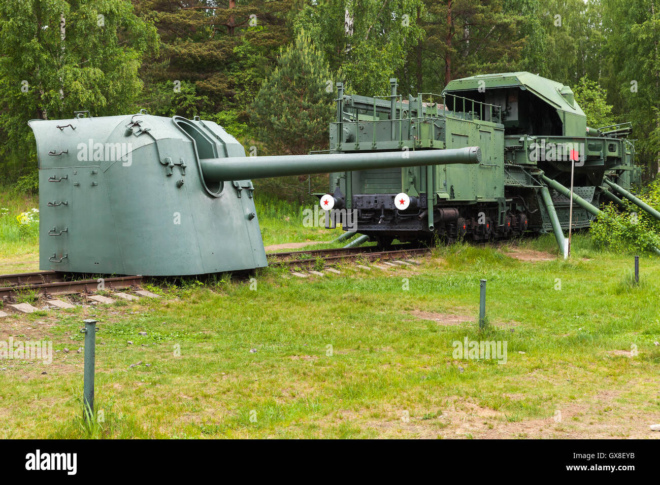 Soviet historical military monument in Krasnaya Gorka fort. TM-1-180 Railway Gun and cannon Stock Photo