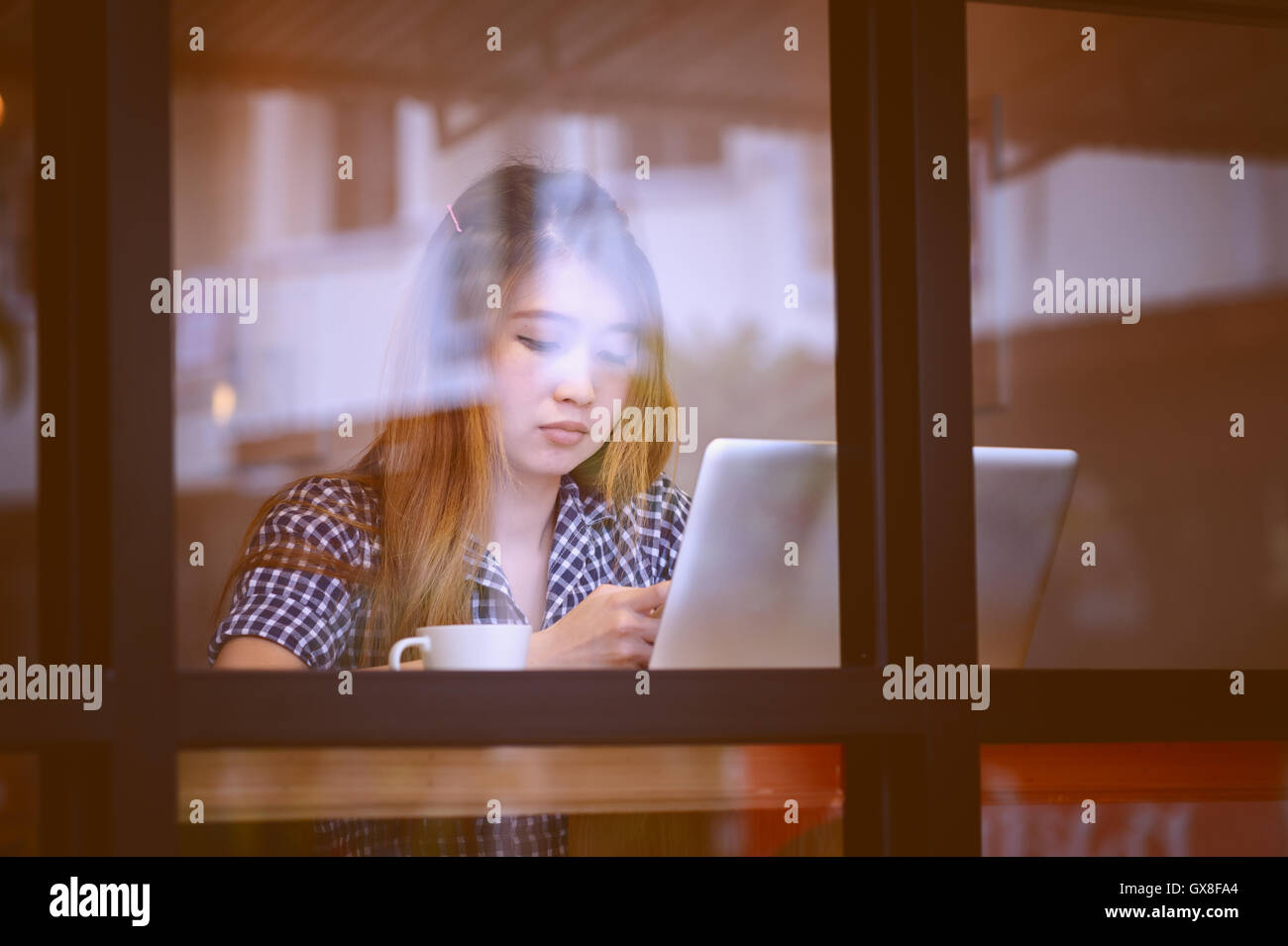 Portrait asia young woman working on laptop in coffee shop, Vacations ...