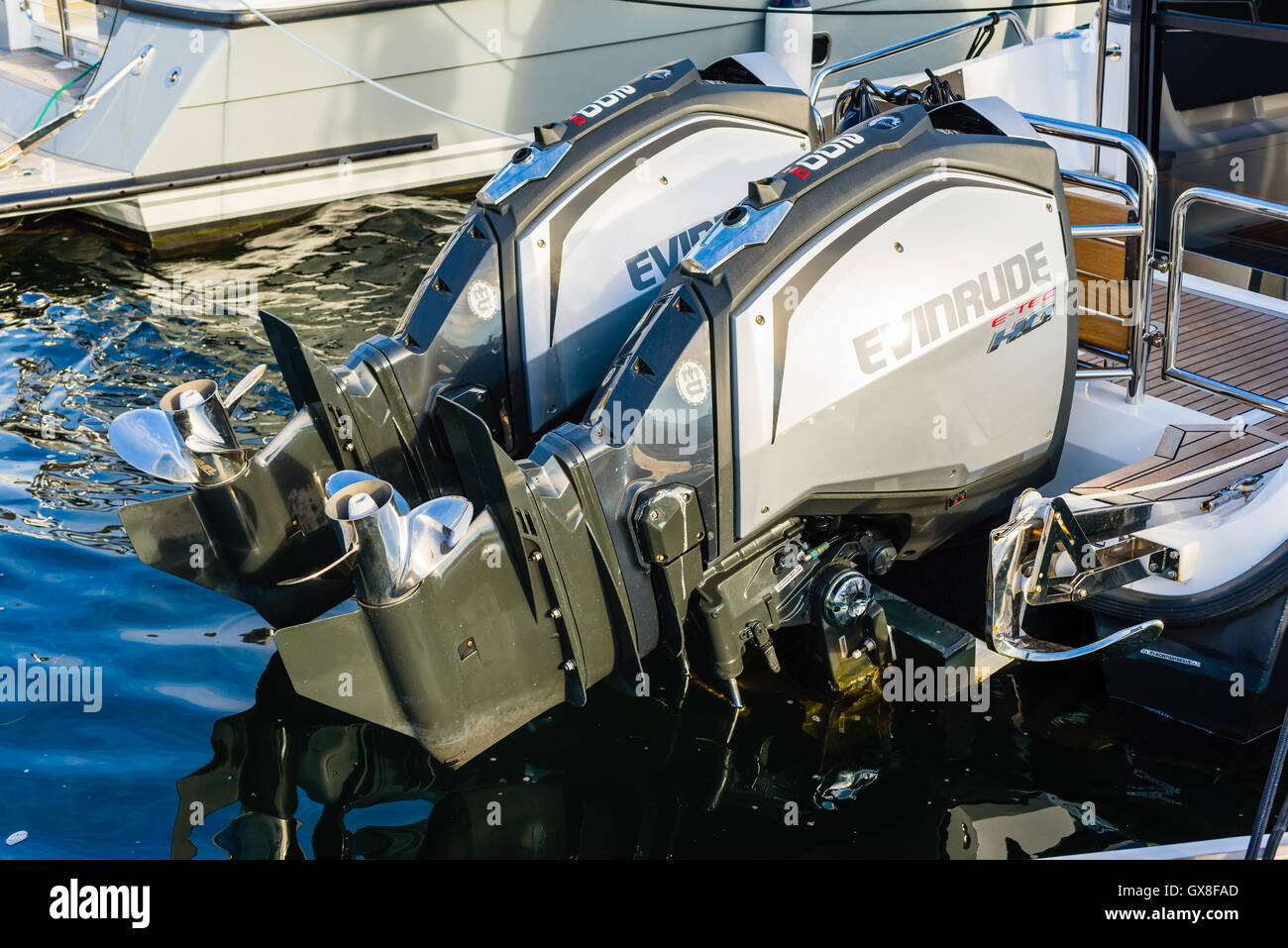 Marstrand, Sweden - September 8, 2016: Environmental documentary of two Evinrude 200 boat motors in the marina. Stock Photo