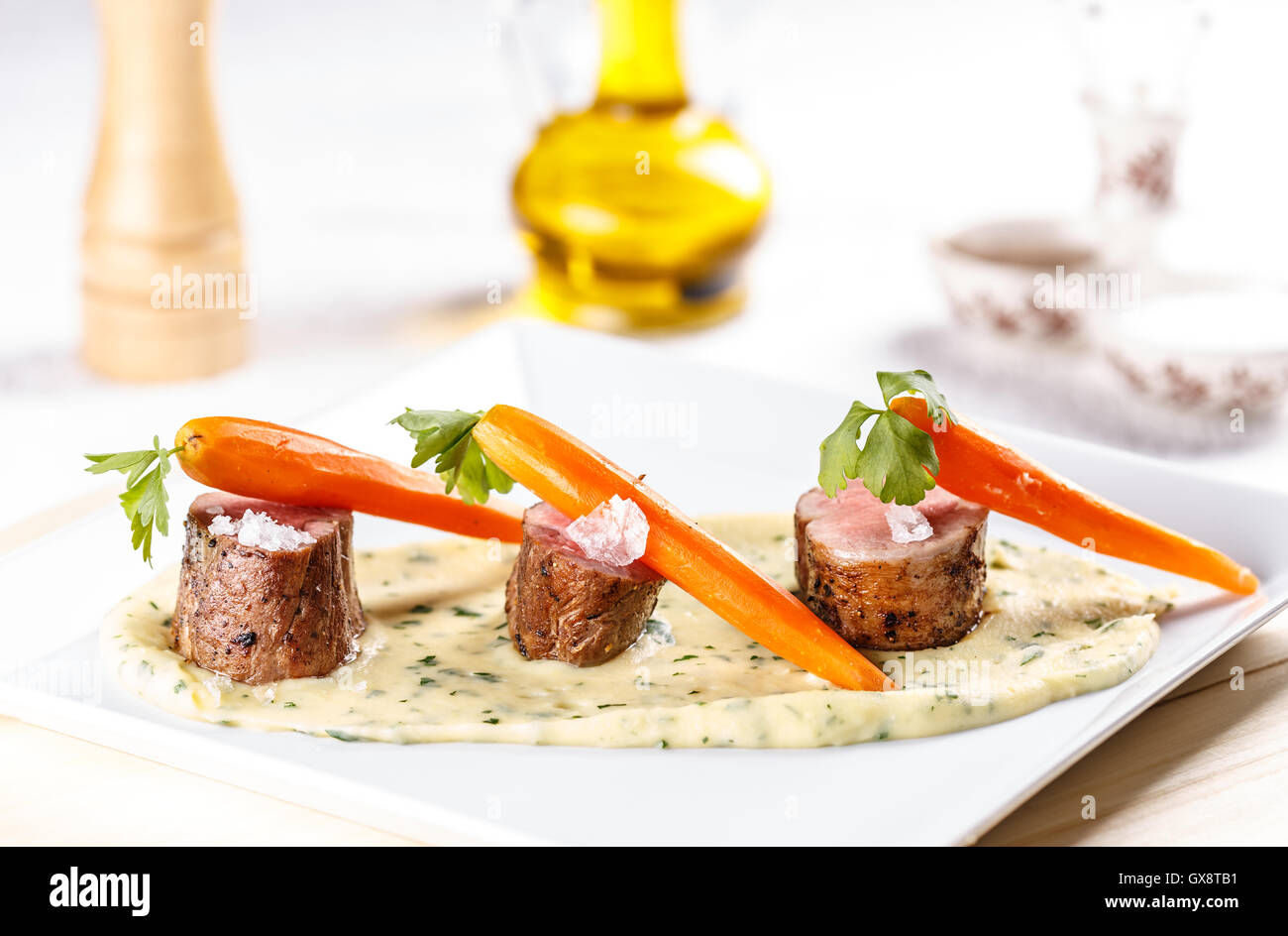 Fine dining, loin pork meat with carrots Stock Photo