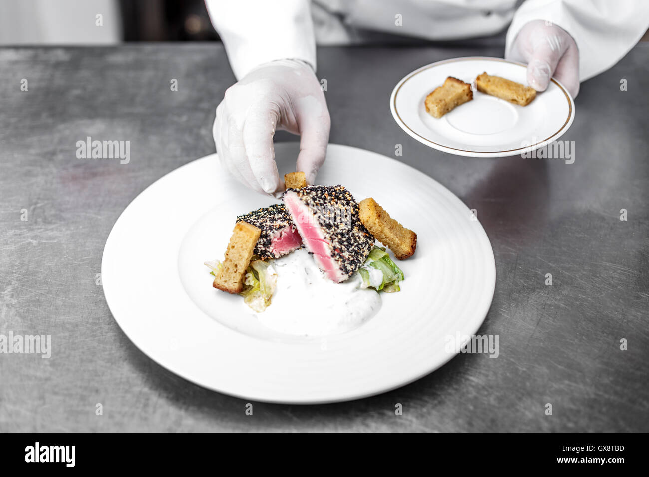 Sliced grilled red tuna steak in sesame Stock Photo