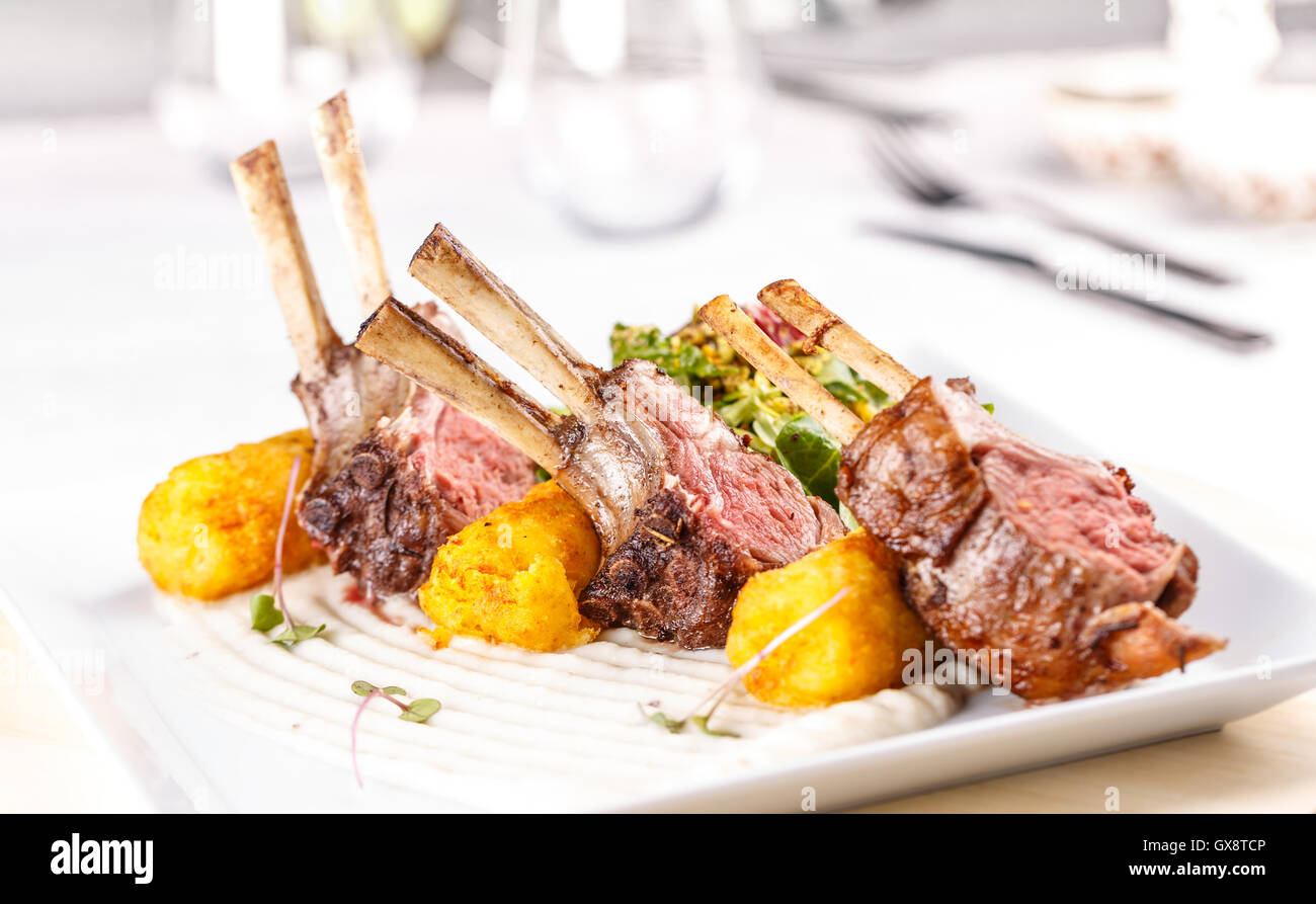 Lamb chops served in fine dining restaurant Stock Photo Alamy
