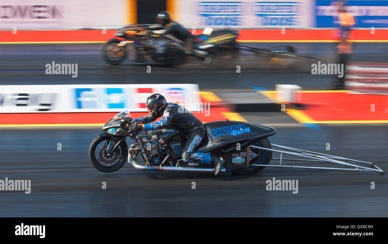 Top fuel motorcycle drag racing at Santa Pod. Stuart Crane on his Suzuki GSX Nitrous PM nearside. Stock Photo