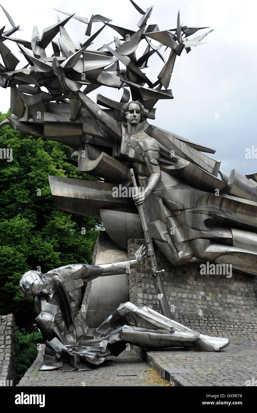 Poland. Gdansk. Monument to the Defenders of the Polish Post. Designed by  Wincenty Kucma (b. 1935). It represents a dying Polish post employee who is being handed a rifle by Nike. Stock Photo