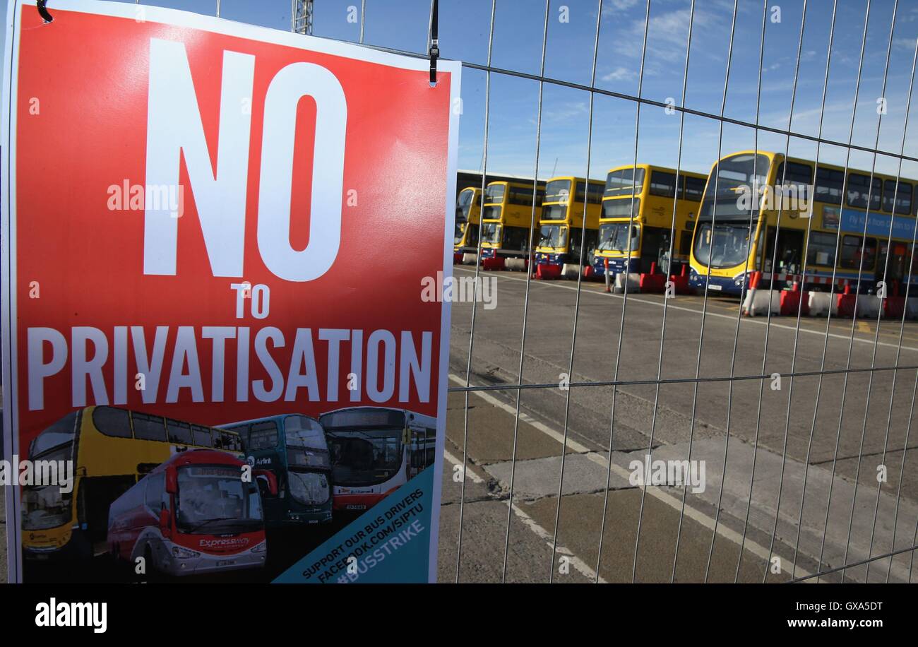 Buses sit idle at the Broadstone Bus depot in Dublin as commuters are