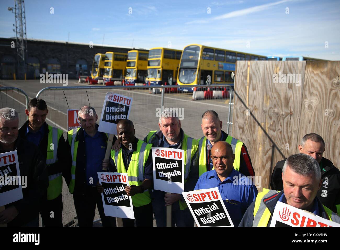 Dublin Bus workers outside the Broadstone Bus depot in Dublin as