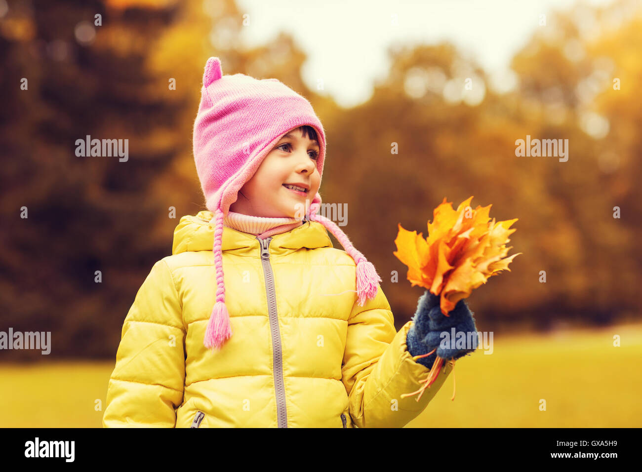 happy beautiful little girl portrait outdoors Stock Photo - Alamy