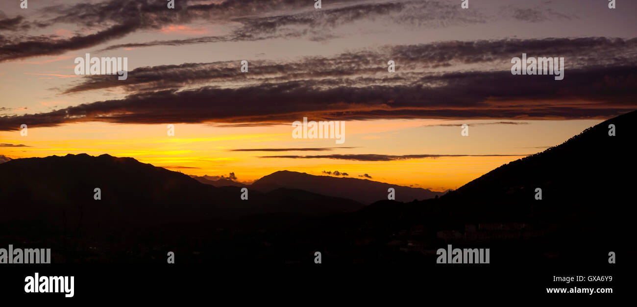 Stratus clouds during a sunset after rain, Mijas mountains, Andalusia, Spain. Stock Photo