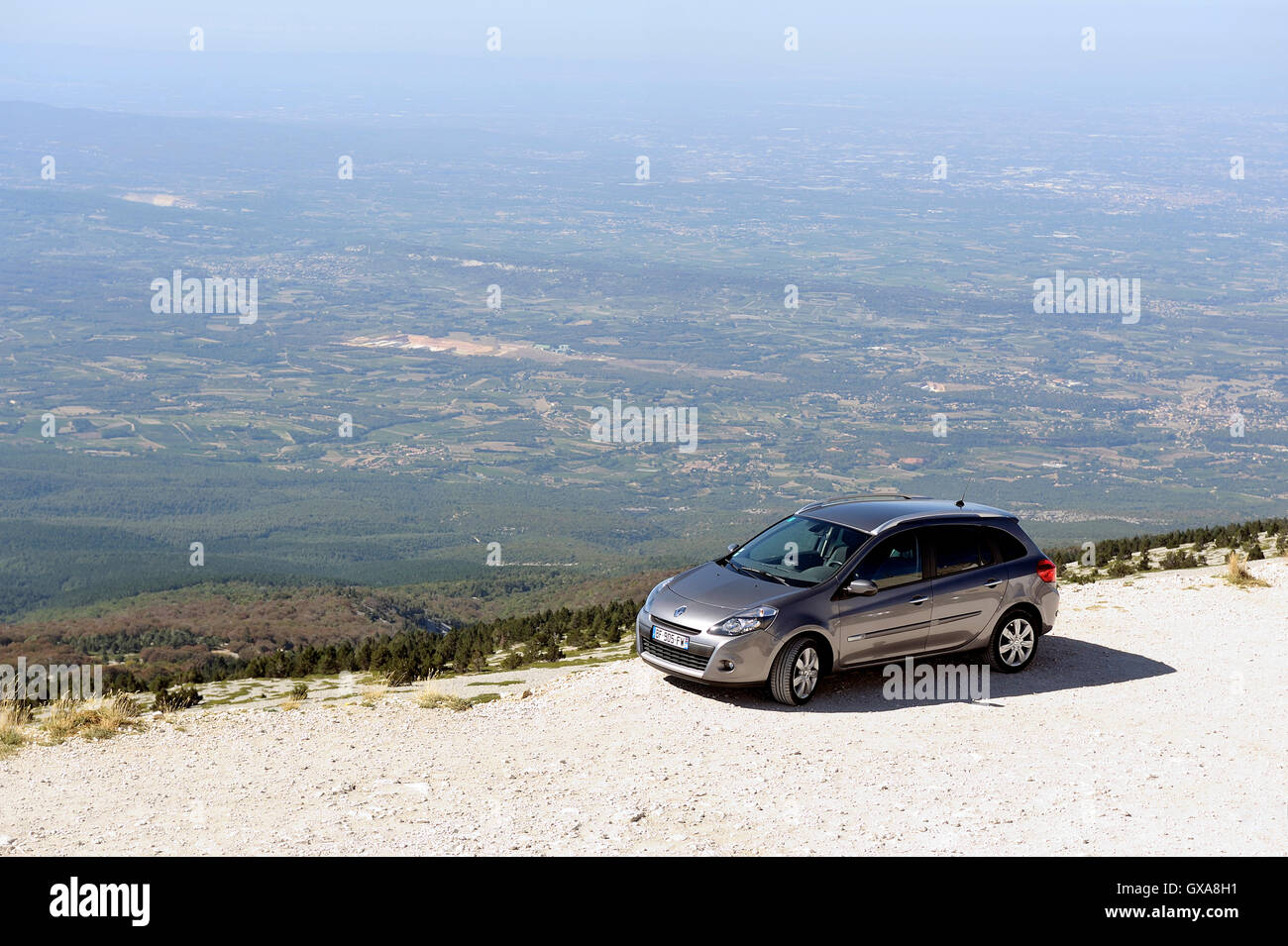 Car parked at the edge of a precipice top of Mont Ventoux Stock Photo