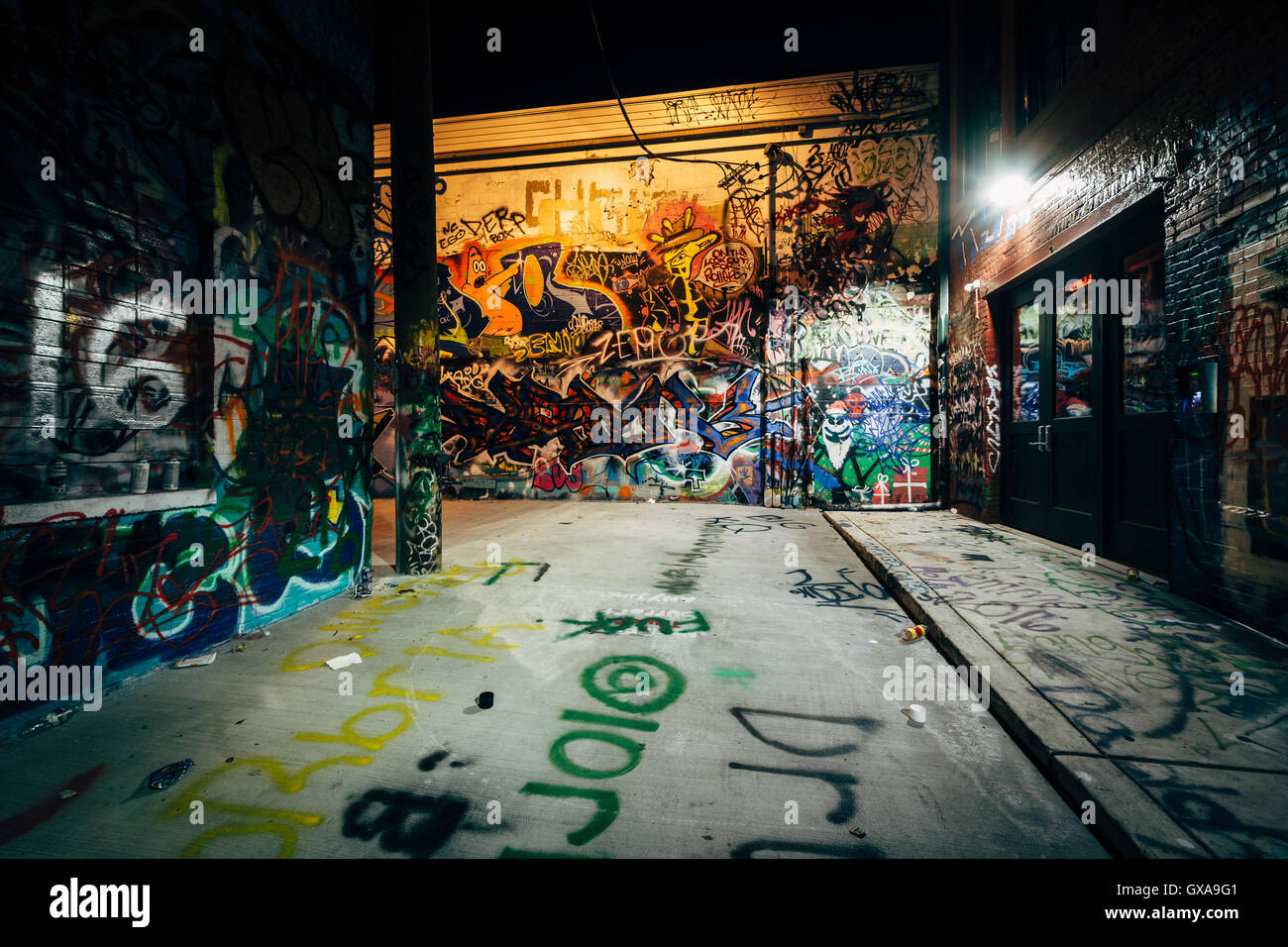 Graffiti Alley at night, in the Station North District, of Baltimore ...