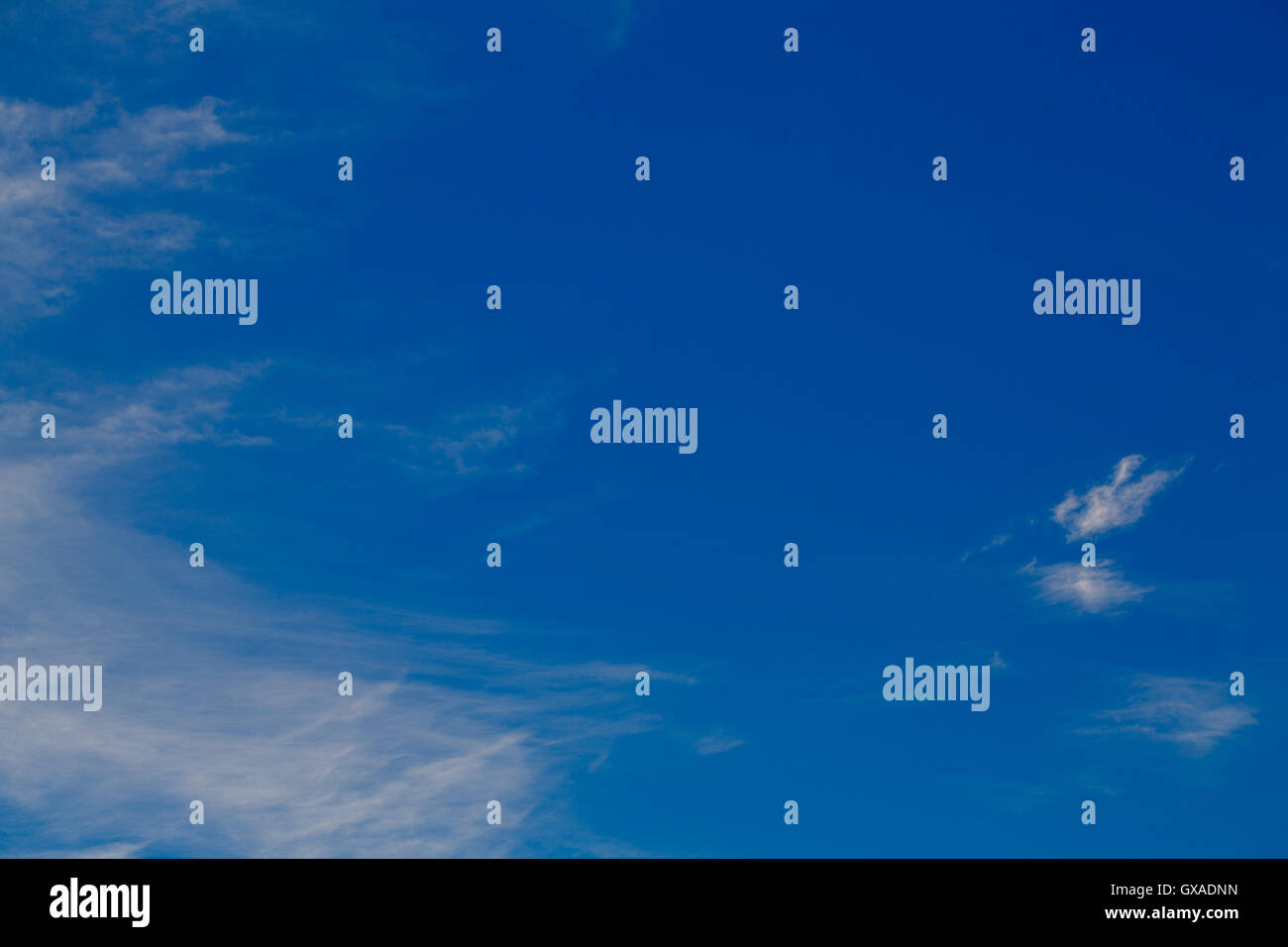 Cumulus clouds against a blue sky. Mostly Cloudy Stock Photo - Alamy
