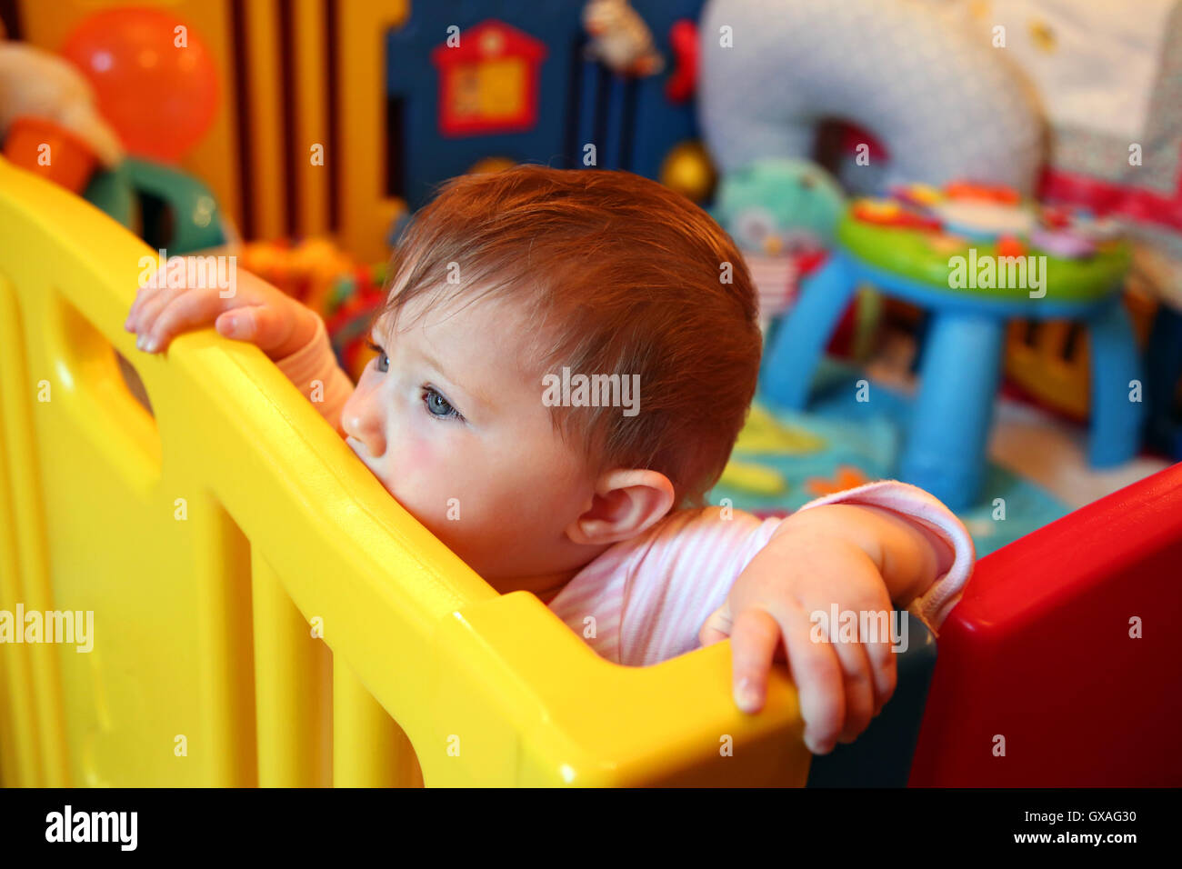 Baby a playpen hi res stock photography and images Alamy