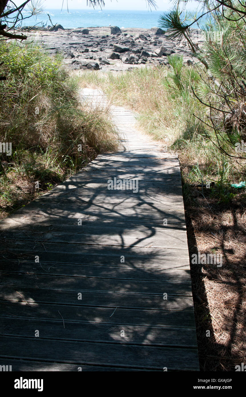 boardwalk leading to the beach and rocks Stock Photo - Alamy