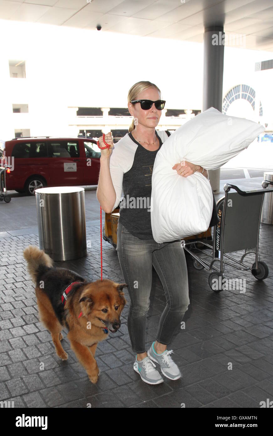 Chelsea Handler Departs From The Airport With Her Dog Featuring Chelsea GXAMTN 