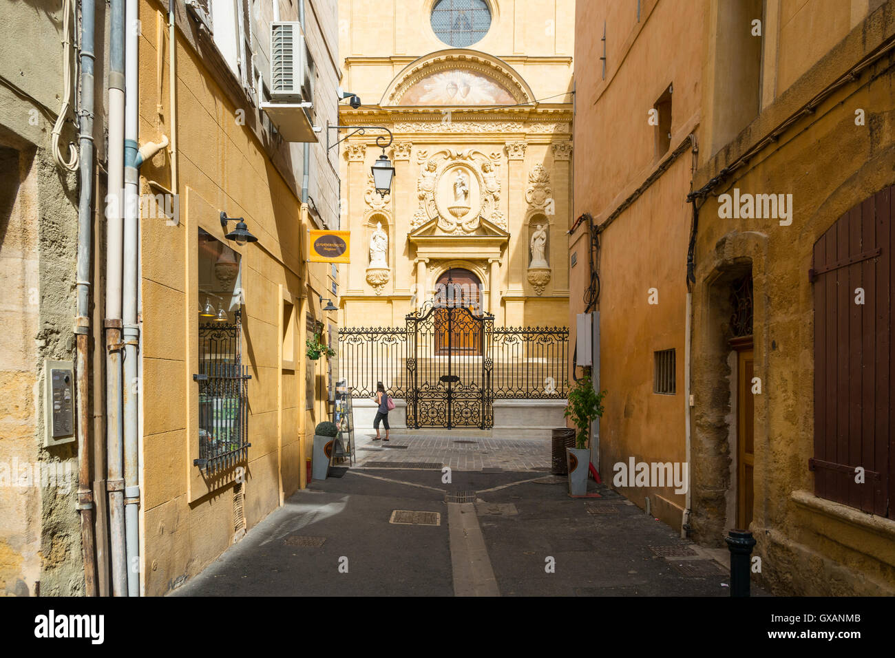 Aix en provence,France-August 9,2016:People strolling down the typical streets of Aix-en-Provence during a summer day. Stock Photo