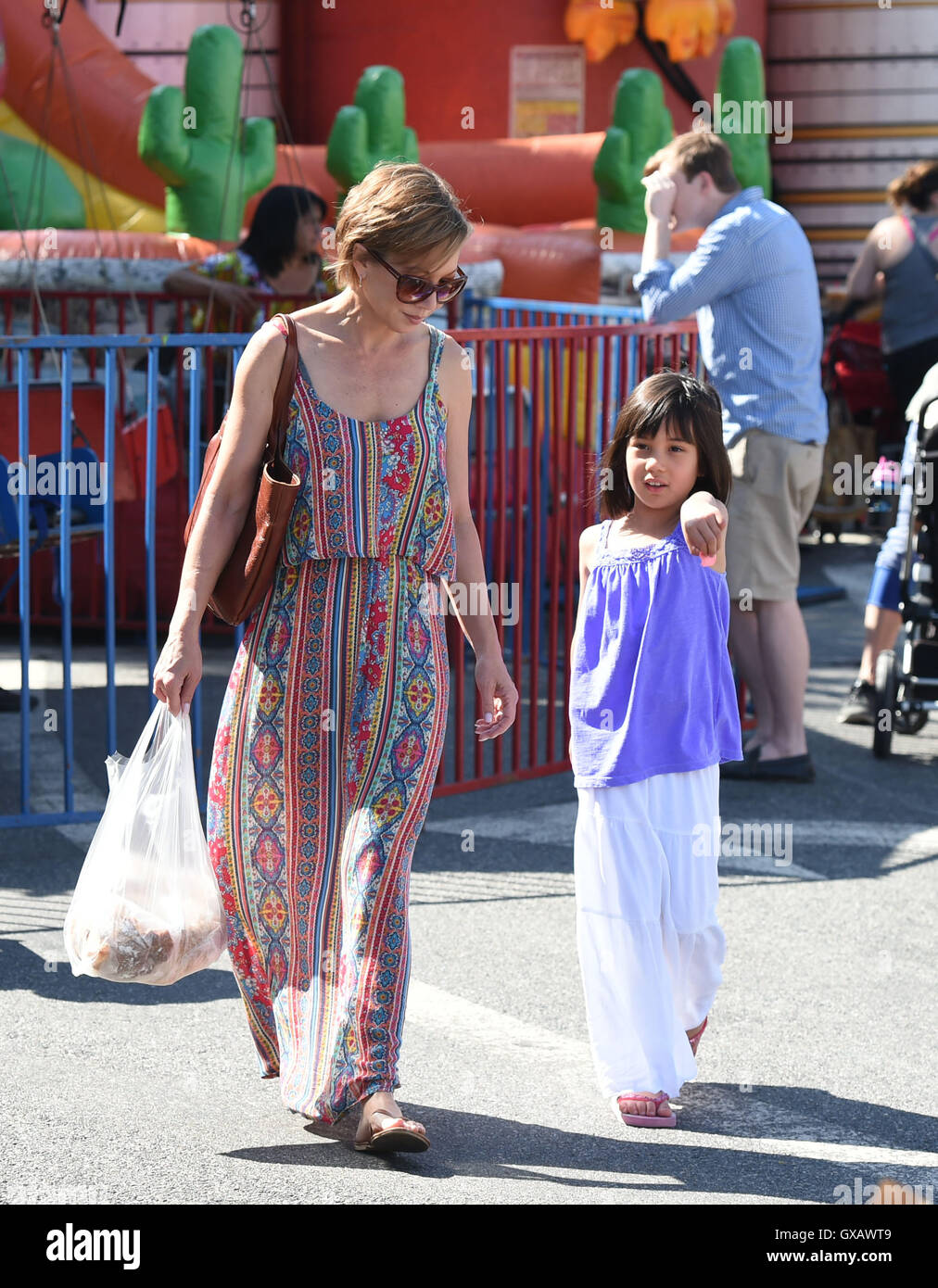 Lisa Joyner takes her daughter, Daisy, to the Farmers Market Featuring