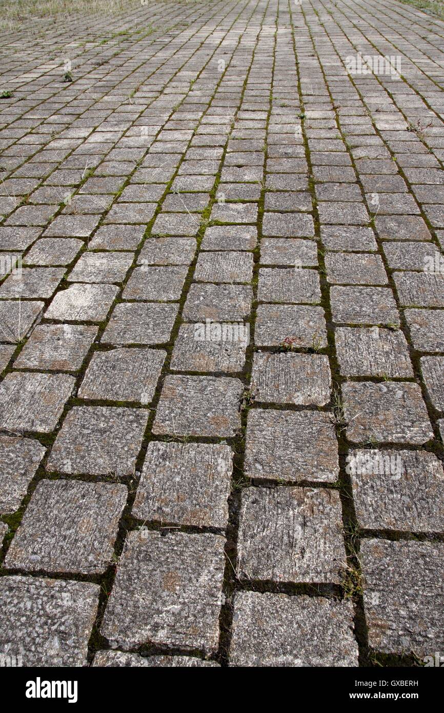 Cobblestone path pattern background, converging perspective Stock Photo