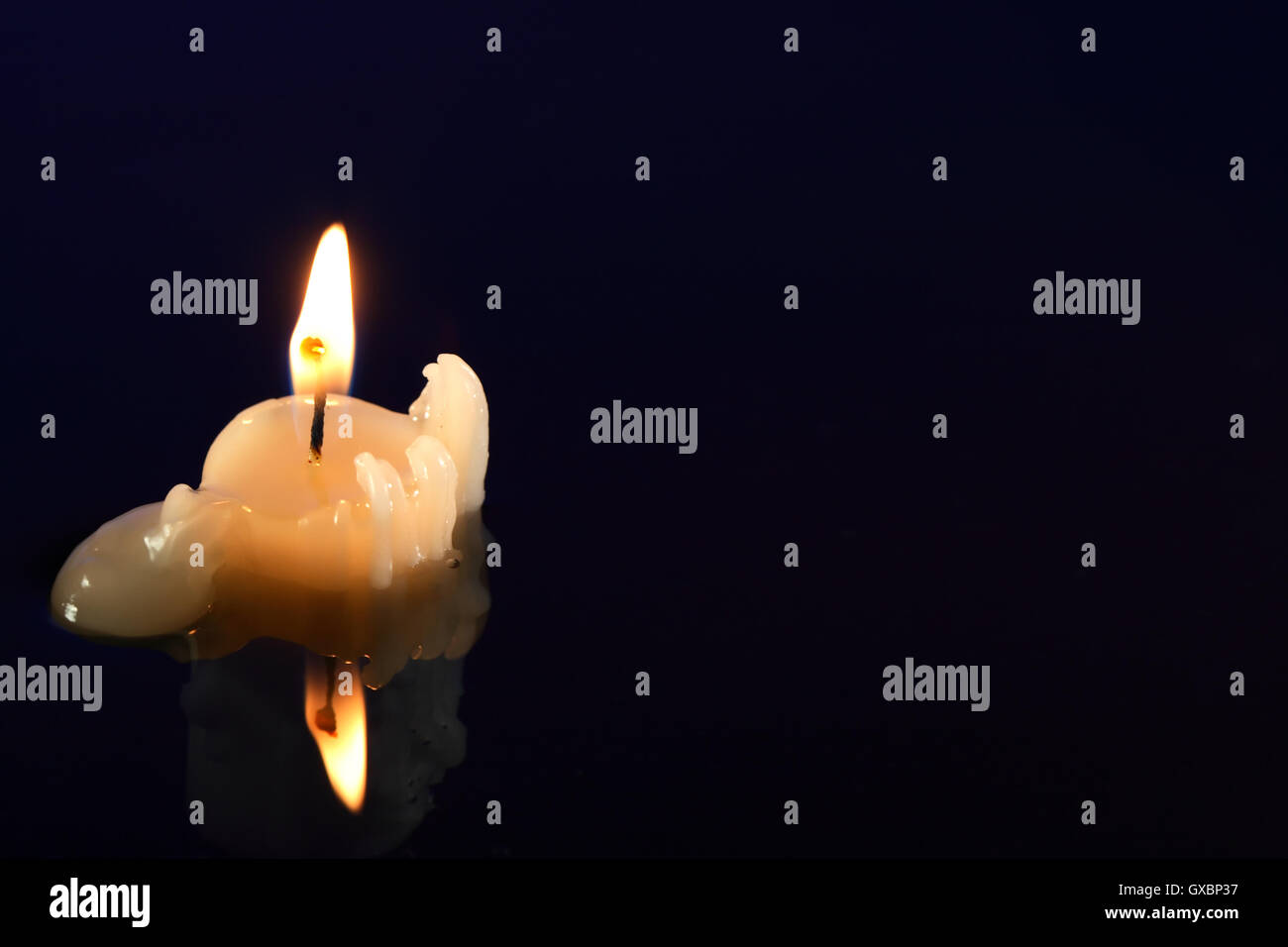 One lighting candle on dark background with free space for text Stock ...