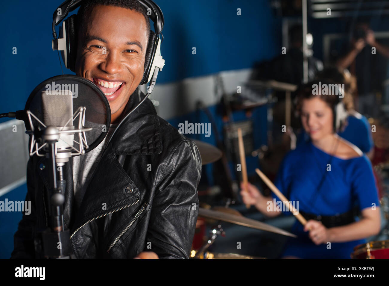 Singer recording a song in studio Stock Photo Alamy