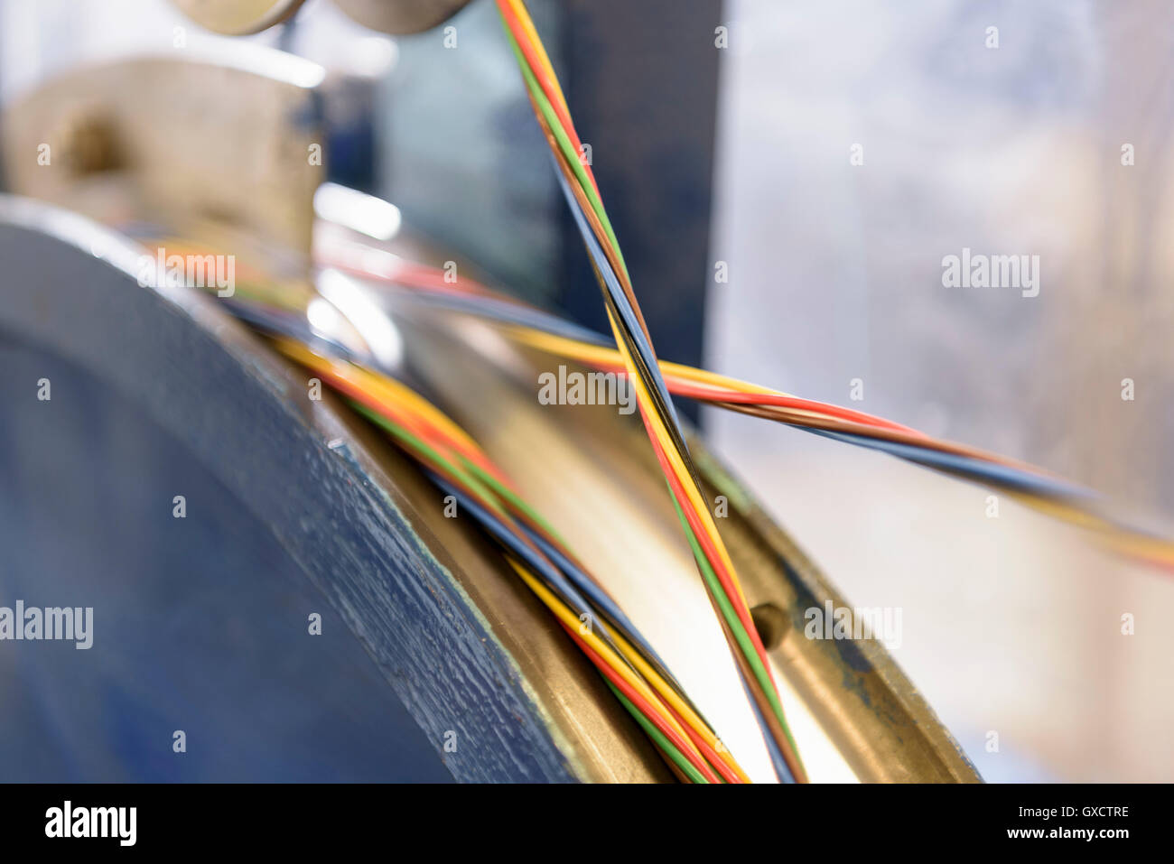 Multicoloured cable in cable factory, close up Stock Photo