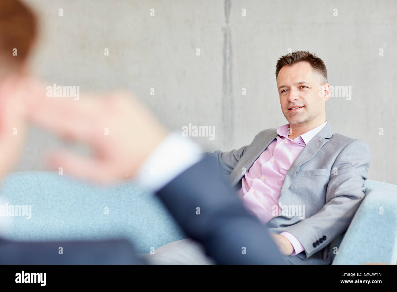 Two businessmen meeting in office Stock Photo
