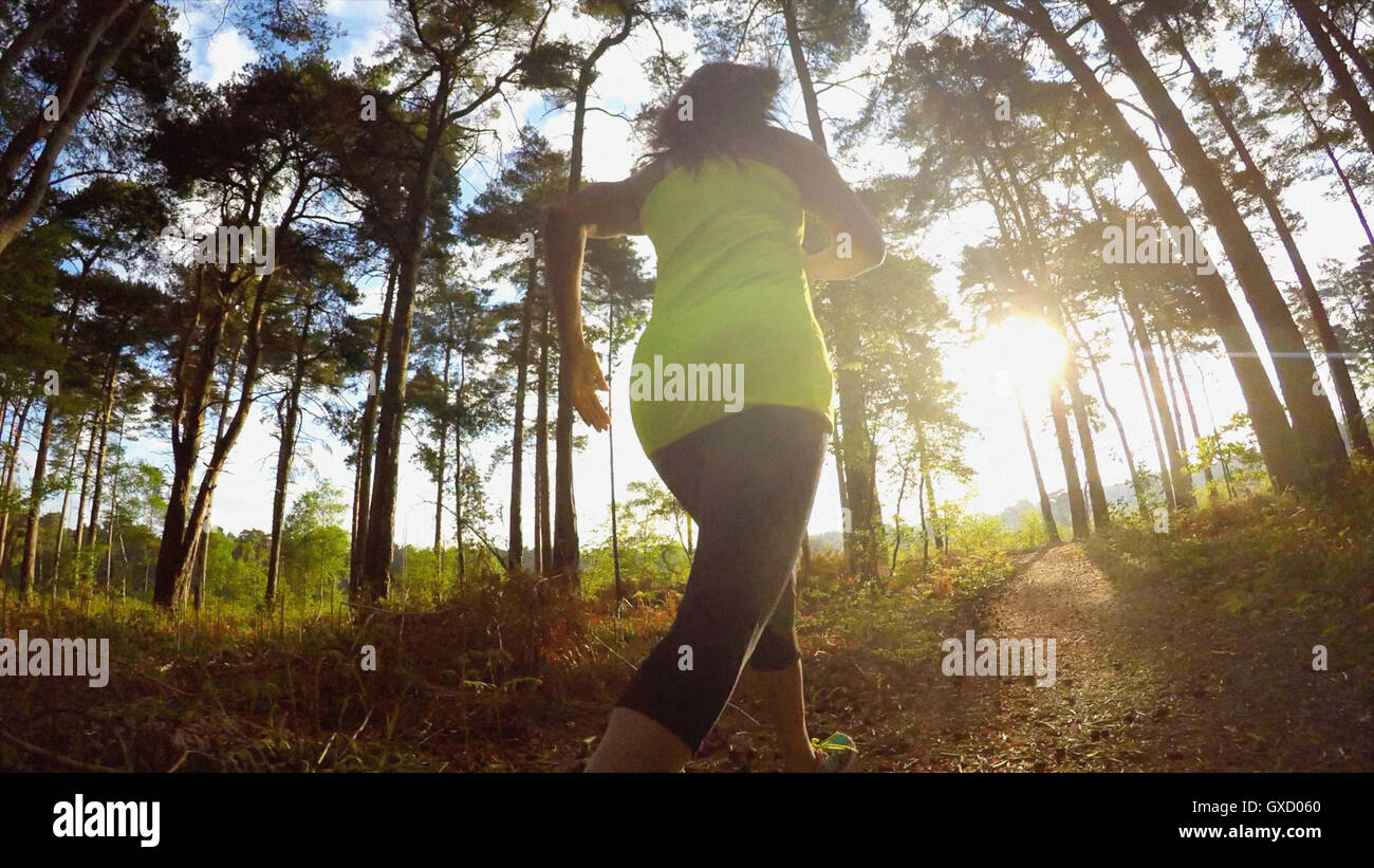 Woman jogging low angle hi-res stock photography and images - Alamy