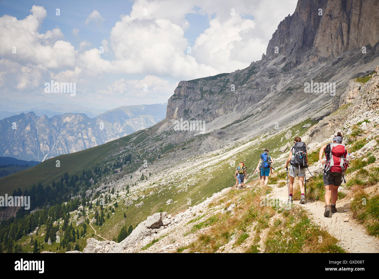 Rear view of hikers on mountain path, Austria Stock Photo