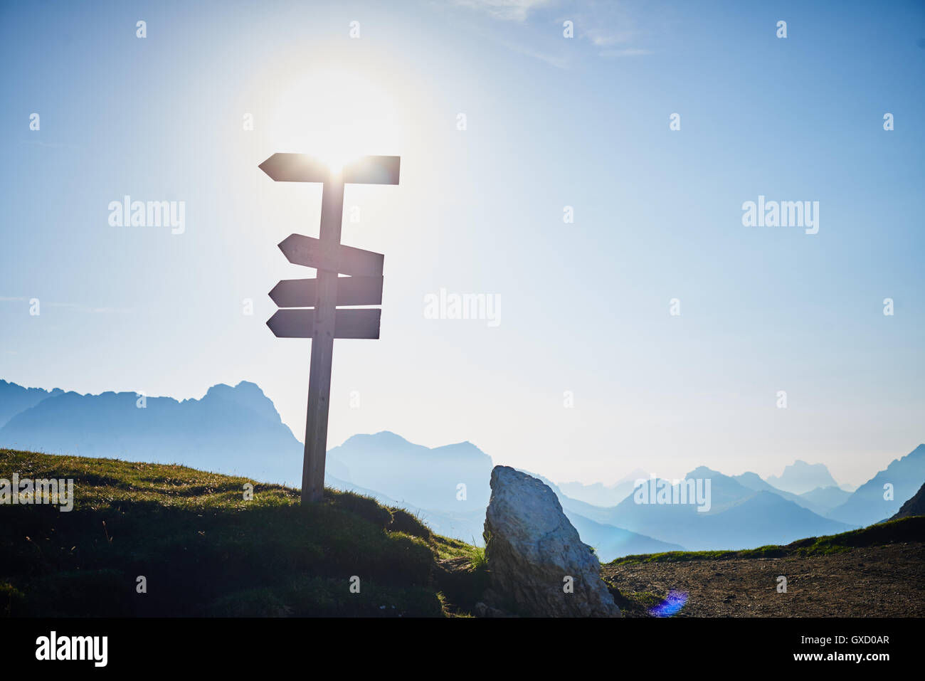 Signpost on mountain in sunlight, Austria Stock Photo