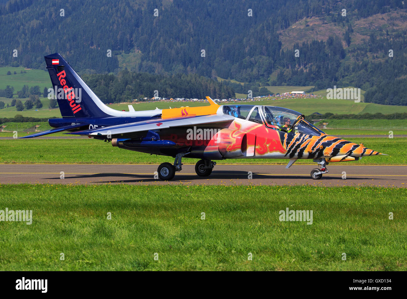 SLIAC, SLOVAKIA - AUGUST 30: Red Bull Alpha Jet waiting on runway at SIAF airshow in Sliac, Slovakia Stock Photo