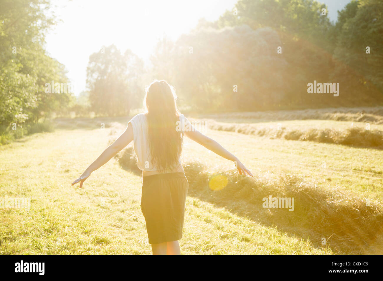 Rear view young woman arms hi res stock photography and images Alamy Rear view young woman arms hi res stock photography and images Alamy