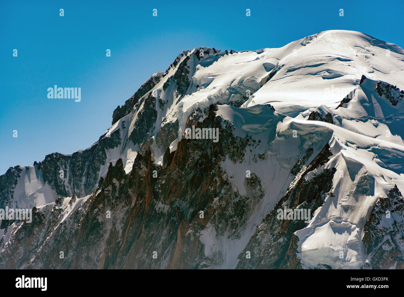 Mont Blanc, highest in Europe, towering above the Chamonix Aiguilles Stock Photo