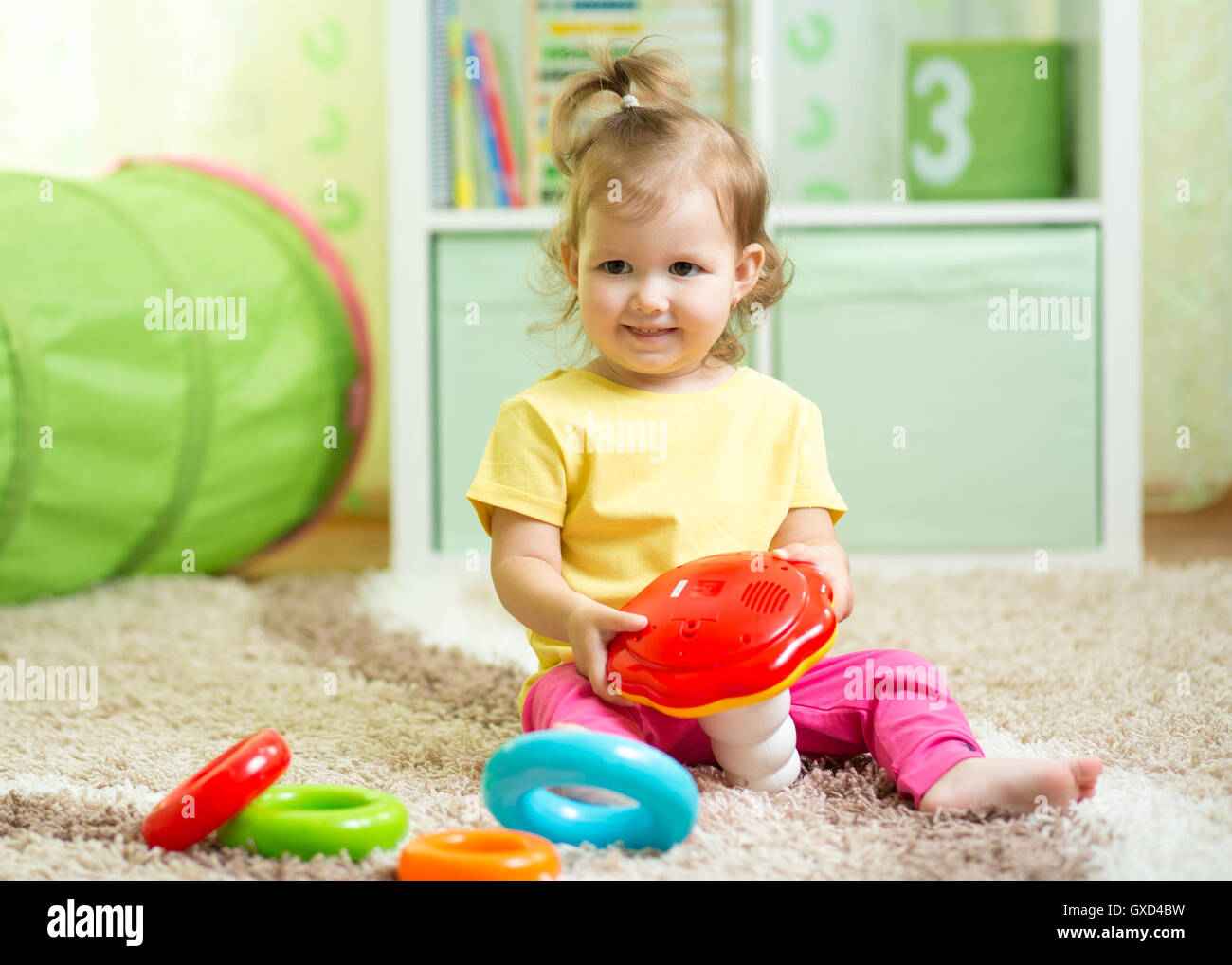 Toddler on the floor hi-res stock photography and images - Alamy