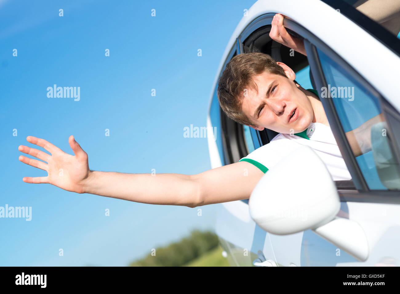 man stuck his hand out of the window Stock Photo - Alamy