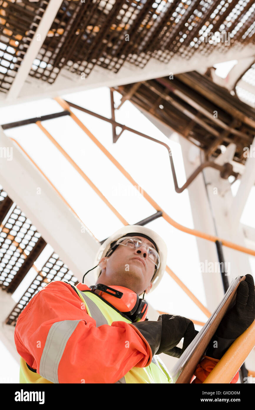 Engineer working on oil rig Stock Photo Alamy