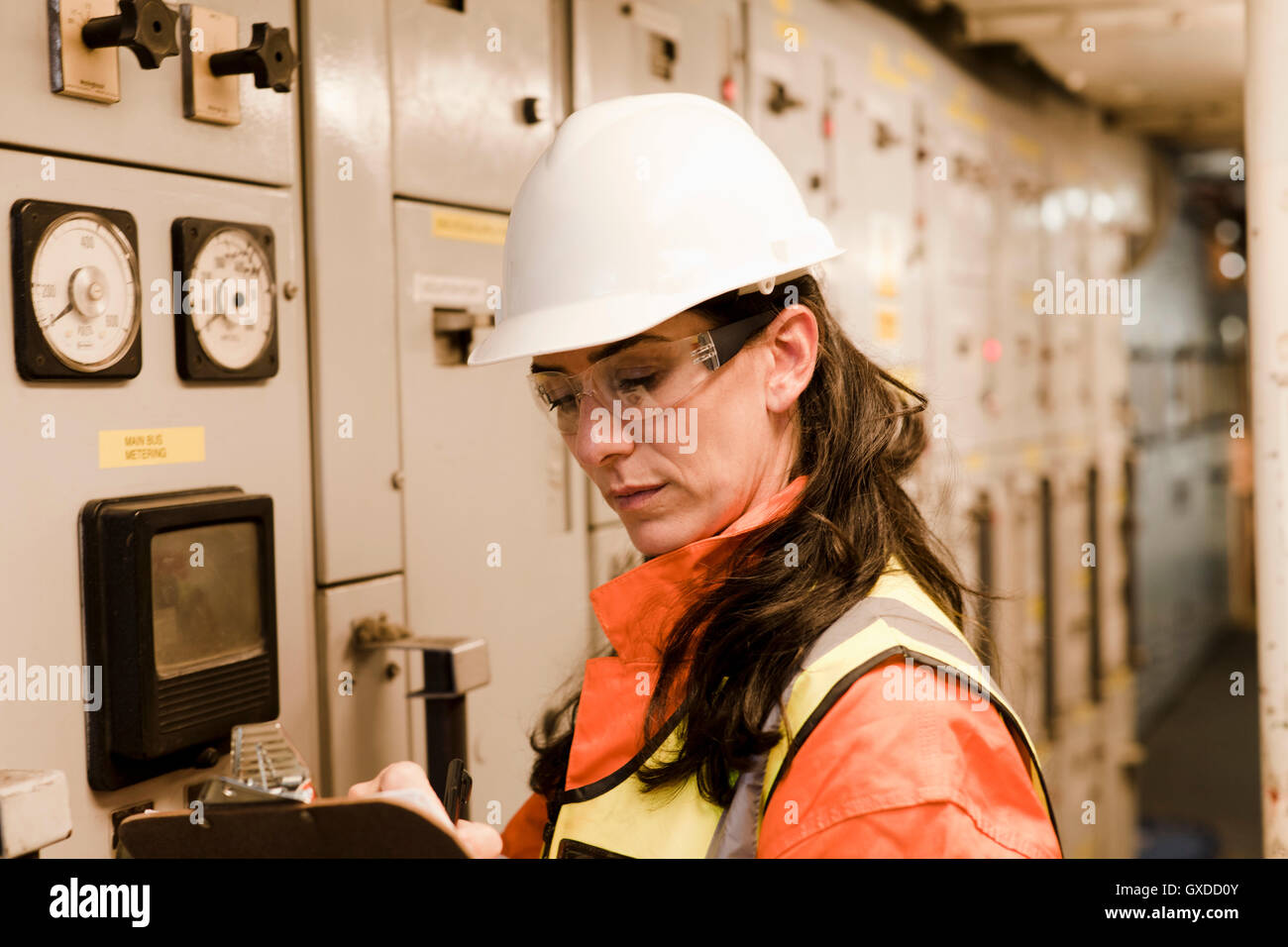 Engineer working on oil rig Stock Photo Alamy