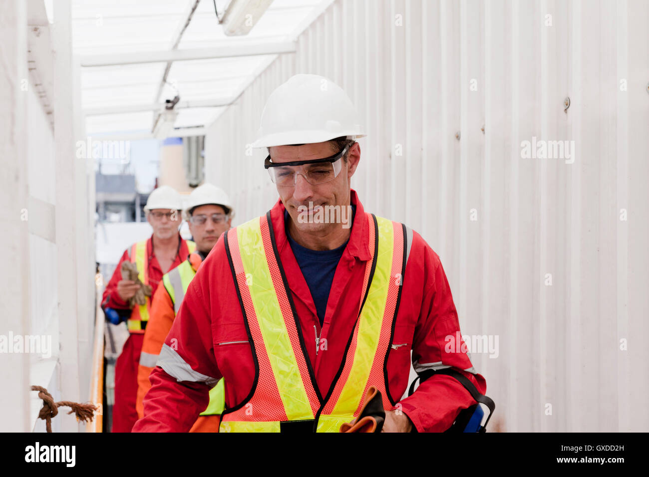 Engineers working on oil rig Stock Photo Alamy