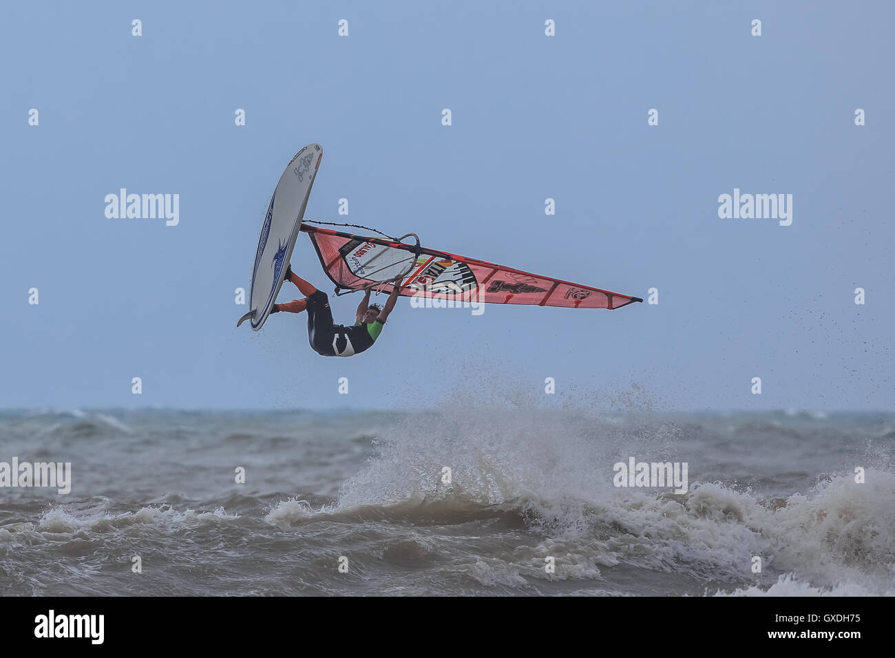 Flying the waves windsurfing Stock Photo