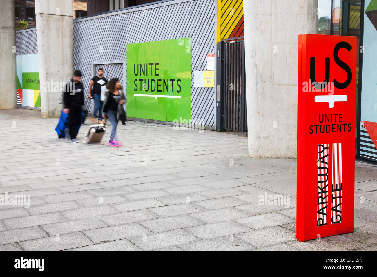 Unite Students sign & logo; Foreign Student arrivals at the Metropolitan University of Manchester, Parkway Gate, in Freshers week September, 2016, UK Stock Photo