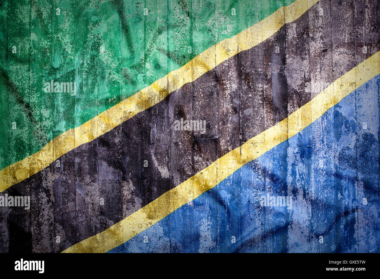 Grunge style of Tanzania flag on a brick wall for background Stock Photo